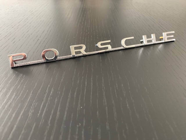 thumbnail image 2 of Porsche 356 / 356A European Reutter Coachbuilder Badge - 644.723.003.01 (64472300301) | Front Left Placement 2 of 3